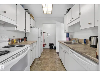 #407 5125 RIVERBEND RD NW photo 18