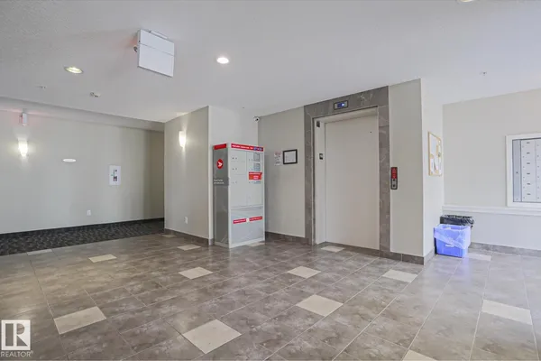 #411 3353 16A AV NW photo 2