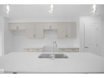 19486 21 AV NW photo 8