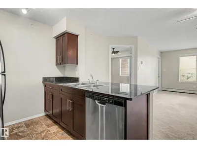#404 1080 MCCONACHIE BV NW photo 7