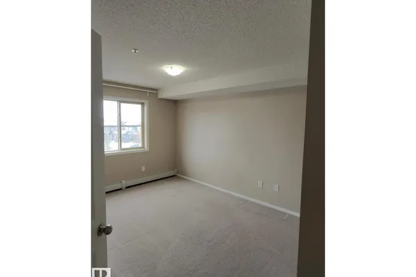 #303 1060 MCCONACHIE BV NW photo 3