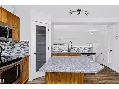 #66 8304 11 AV SW photo 18