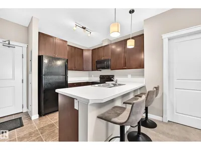 #411 3715 WHITELAW LN NW photo 6