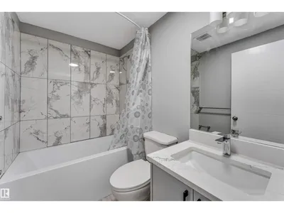 2639 17 AV NW photo 44