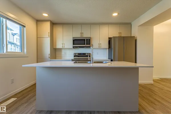 #109 1025 SECORD PROMENADE PM NW photo 2