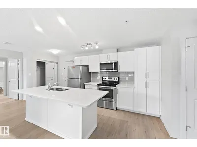 #112 5404 7 AV SW photo 16