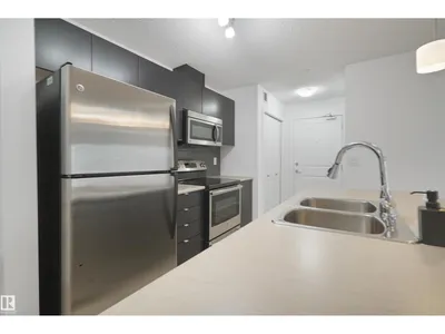 #114 3357 16A AV NW photo 12