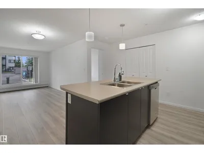 #114 3357 16A AV NW photo 8
