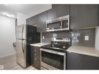 #114 3357 16A AV NW photo 7