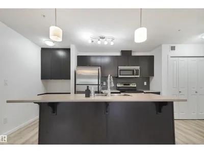 #114 3357 16A AV NW photo 38