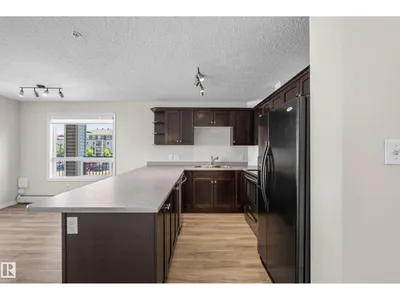 #6223 7331 SOUTH TERWILLEGAR DR NW photo 6