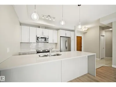 #310 625 LEGER WY NW photo 11
