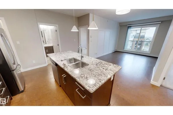 #404 5510 Schonsee DR NW photo 3