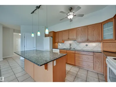 #416 1406 HODGSON WY NW photo 11