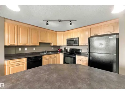 #202 6220 134 AV NW photo 10