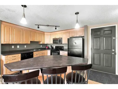 #202 6220 134 AV NW photo 6
