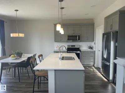 7939 ERASMUS CR NW photo 16