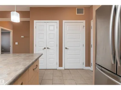 #210 8730 82 AV NW photo 24