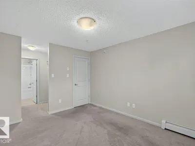 #103 508 ALBANY WY NW photo 6